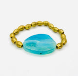 Teal & Ethiopian brass