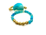 Teal & Ethiopian brass