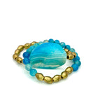 Teal & Ethiopian brass