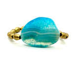Teal & Ethiopian brass