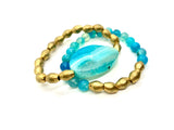 Teal & Ethiopian brass